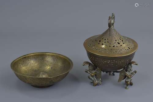 An Eastern bronze incense burner and cover