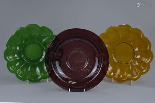 A pair of Chinese Amber and Green fluted Peking glass dishes