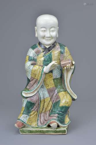 A Chinese 19th C. Famille verte porcelain figure of a 'doctor'