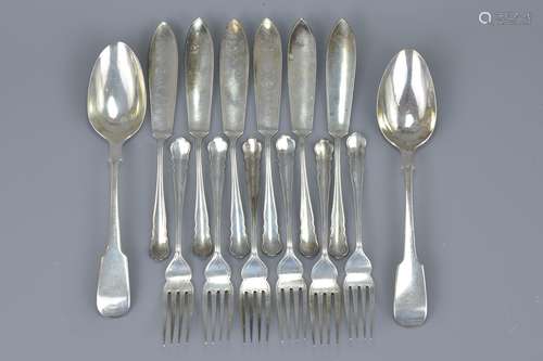 A set of twelve antique silver fish knives and forks together with two silver hallmarked spoons