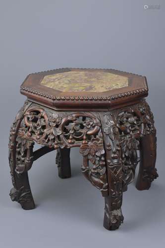 A Chinese 19th C. hardwood stand with marble top