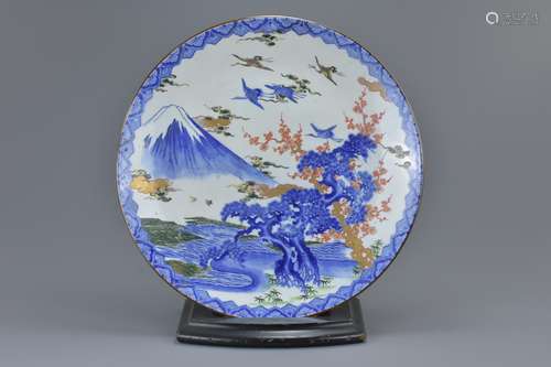 A large Japanese early 20th C. porcelain charger