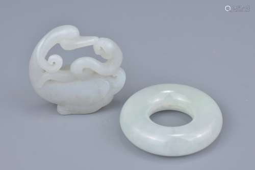 A Chinese white jade carving of 'dragon and crane'