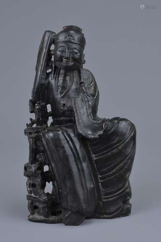 A Chinese carved soapstone figure of Immortal. 18cm tall