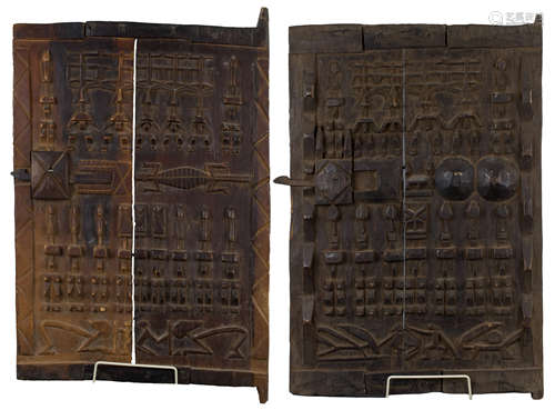 Two West African Dogon carved wood granary store doors