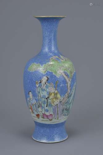 A Chinese early 20th C. Republic period sgraffito blue ground vase