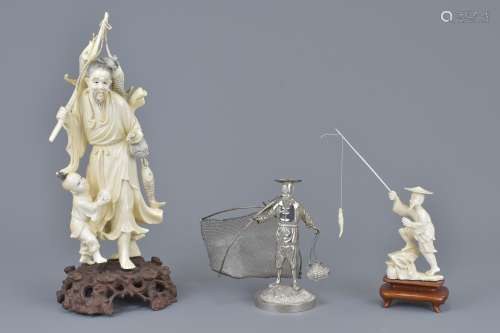 A large Chinese early 20th C. carved ivory figure with silver fisherman