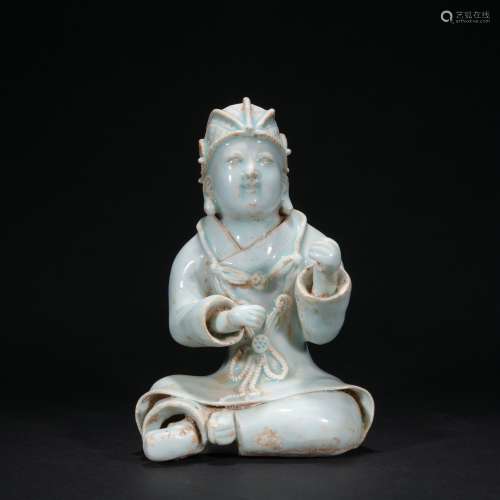 A celadon-glazed figure,Qing dynasty