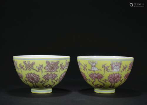 A pair of yellow-ground and red glazed 'floral' cup,Qing dynasty