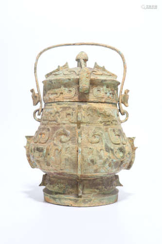 a chinese taotie pattern bronze vessel,the shang and zhou dynasty