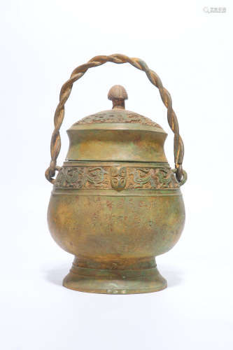 a chinese bronze pot with handle,the west han dynasty