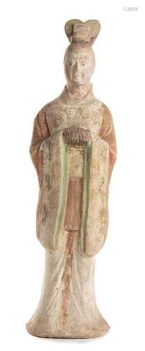 A PAINTED CERAMIC FUNERARY MODEL OF A TOMB GUARDIA…