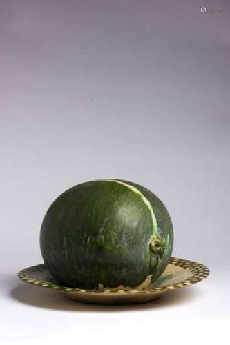 A SANCAI GLAZED DISH WITH A WATERMELON China, Tang…