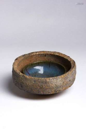 A SAGGAR CONTAINING A JUNYAO PURPLE SPLASHED BOWL …