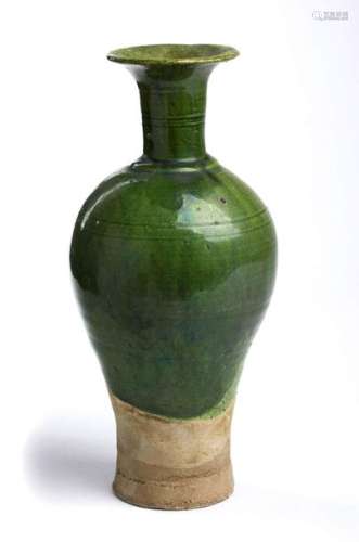 A GREEN GLAZED BOTTLE VASE China, Liao dynasty The…