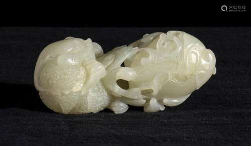 A PALE GREEN JADE CARVING China, Qing dynasty, 19t…