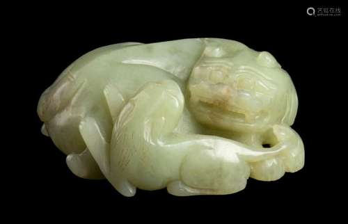 A PALE GREEN JADE LION AND CUB China, 19th 20th ce…