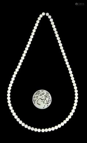 A WHITE JADE BEADS NECKLACE WITH PENDANT China, 20…