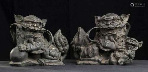 A PAIR OF METAL SCULPTURES OF BUDDHIST LIONS China…