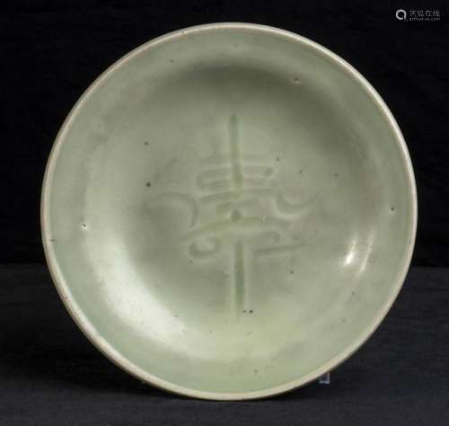 A CÉLADON GLAZED PORCELAIN DISH China, Qing dynast…