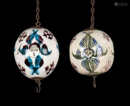 TWO 'KUTHAYA' PAINTED AND GLAZED POTTERY EGG SHAPE…