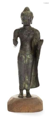 A BRONZE SCULPTURE OF A STANDING BUDDHA Thailand, …