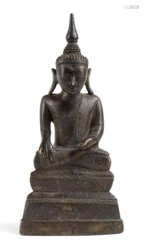 A BRONZE INSCRIBED SCULPTURE OF BUDDHA Burma, 19th…