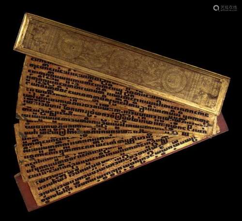 A LACQUERED AND GILT WOOD AND FABRIC MANUSCRIPT, K…