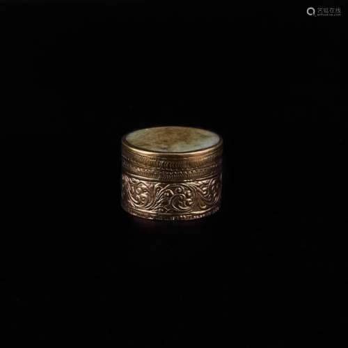 Small cylindrical box covered in gilt copper, deco…