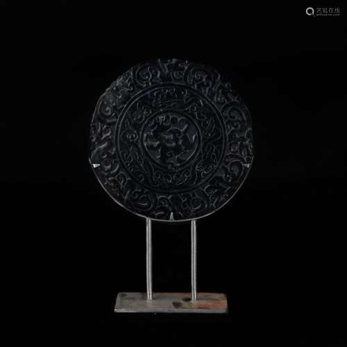 Amphibole disc with archaic openwork decoration of…