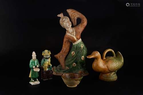 Set of glazed terracotta, including two tang style…
