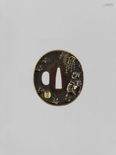 A GOLD AND SILVER-INLAID SHAKUDO TSUBA WIT…