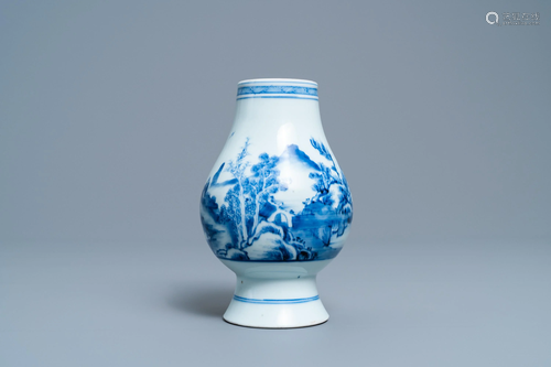 A Chinese blue and white vase with a landscape…