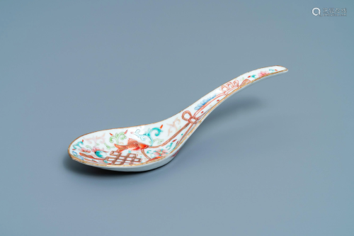 A large Chinese famille rose relief-moulded spoon,