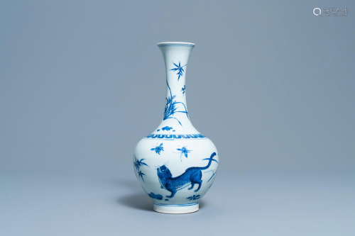 A rare Chinese blue and white bottle vase with a tiger