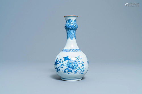 A Chinese blue and white bottle vase with floral