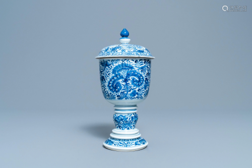 A Chinese blue and white beaker and cover with…