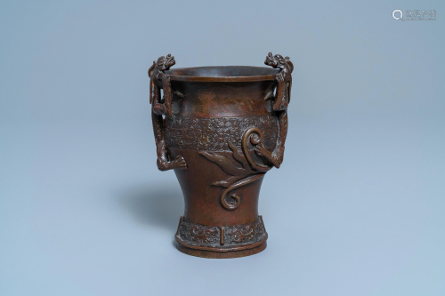 A Chinese dragon-handled bronze vase, Ming