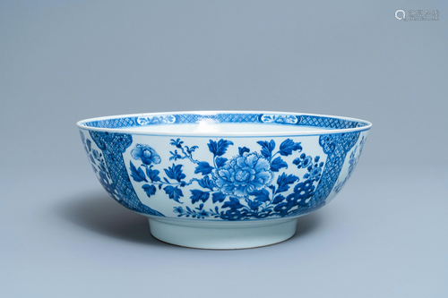 A large Chinese blue and white bowl with floral d…