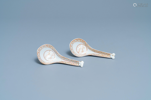 A pair of Chinese iron red and gilt spoons for the