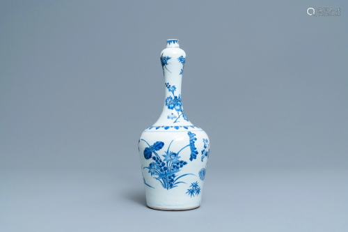 A Chinese blue and white bottle vase with floral