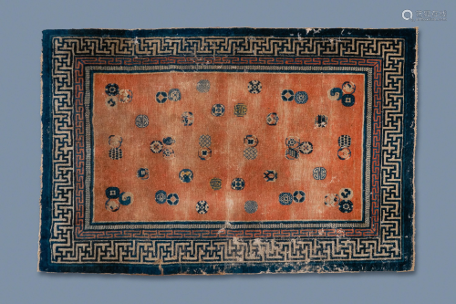 A rectangular Chinese hand-knotted wool carpet with