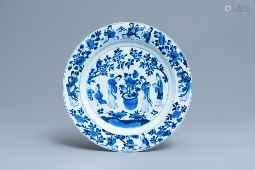 A Chinese blue and white dish with ladies aroun…