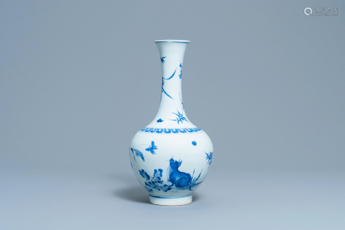 A rare Chinese blue and white bottle vase with a cat