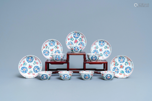 Seven Chinese famille rose cups and five saucers,