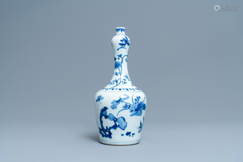 A Chinese blue and white bottle vase with floral