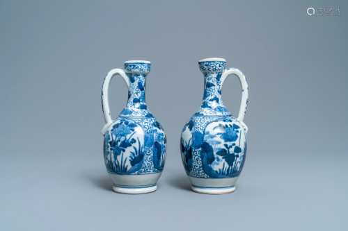 A pair of Japanese blue and white Arita jugs, Edo,