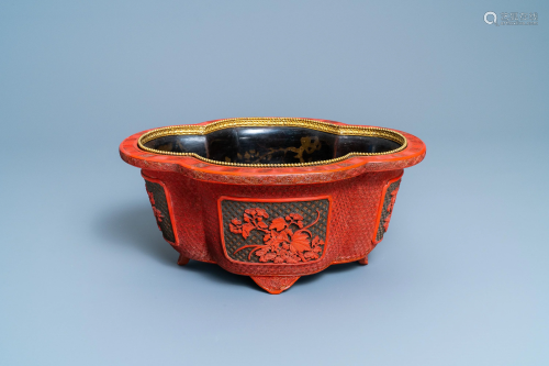 A Chinese quatrefoil jardiniere in red and black