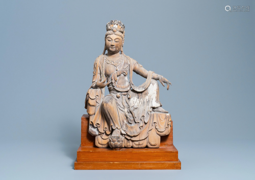 A Chinese painted wooden figure of Guanyin, …