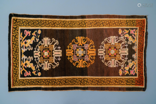 A rectangular Chinese hand-knotted wool carpet, 1…